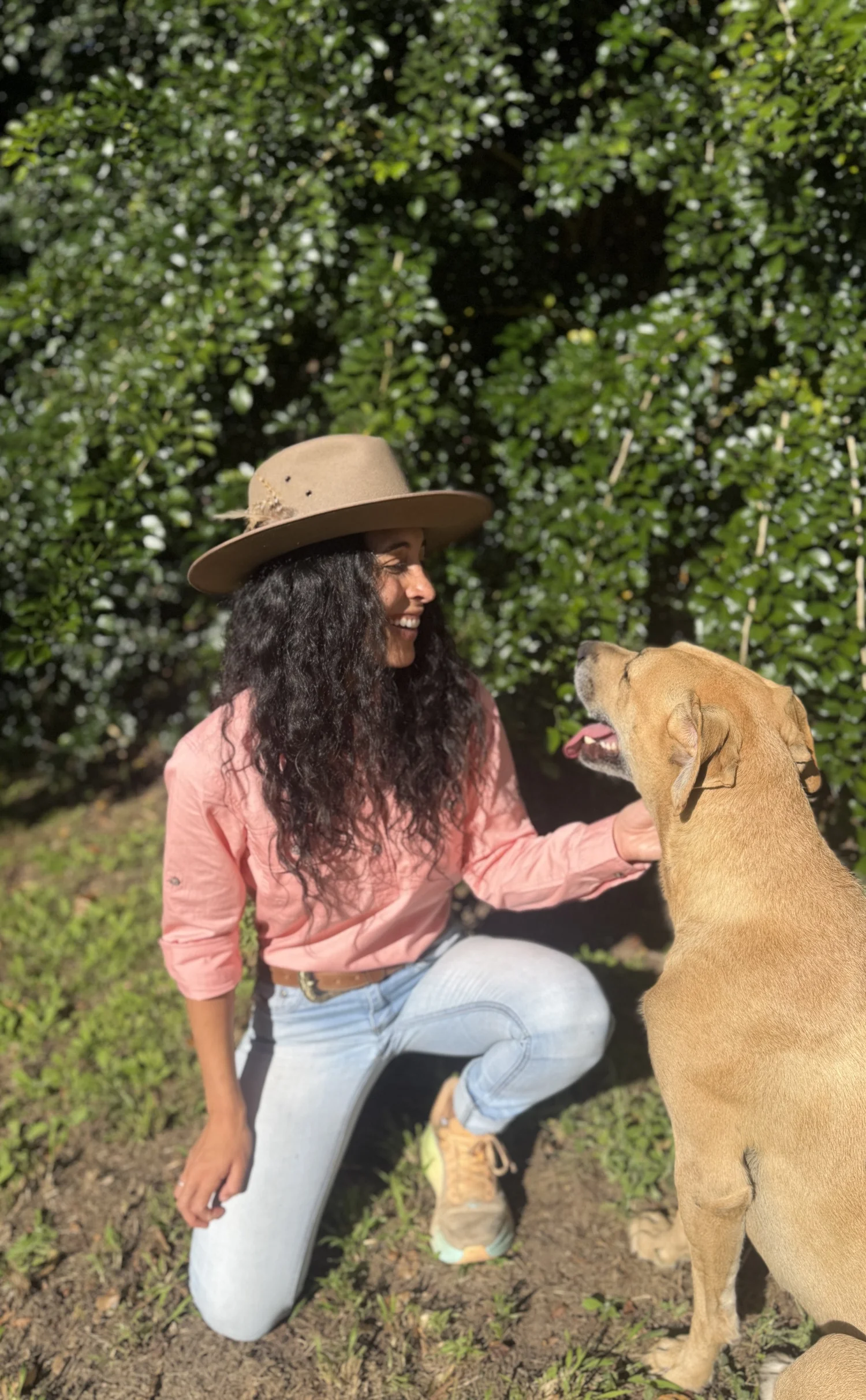Ceci with a happy dog outdoors